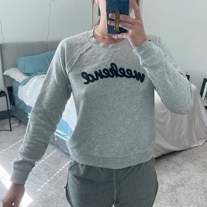 Grey crewneck sweatshirt